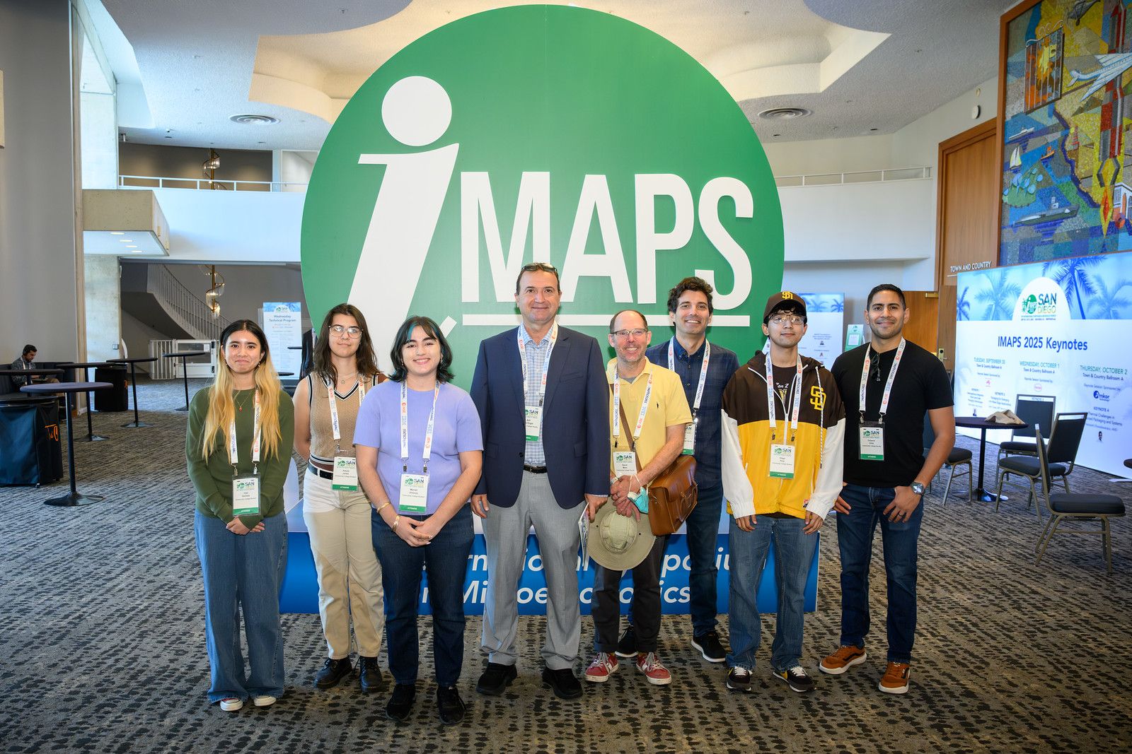 Dr. Arif Ege Engin, Dr. Baris Aksanli, Dr. David Marx (PSY), Professor Octavio Ortiz (Imperial Valley College), and Imperial Valley College students at IMAPS Symposium 2025.